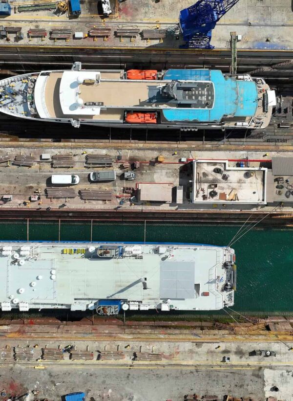 Aerial,Drone,Top,View,Photo,Of,Shipyard,Repairing,Small,Passenger Aerial,Drone,Top,View,Photo,Of,Shipyard,Repairing,Small,Passenger